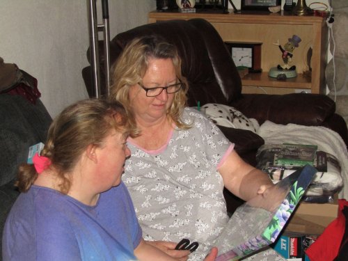 mom and Melissa opening presents 